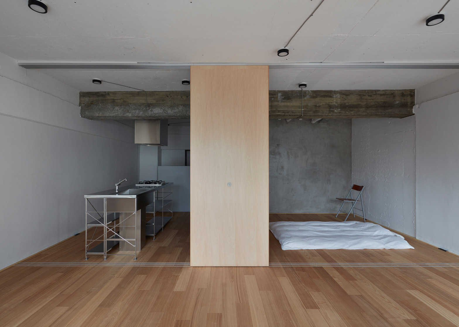 Small-Apartment-FrontOfficeStudio-Tokyo-Kitchen-and-Bedroom-Humble-Homes